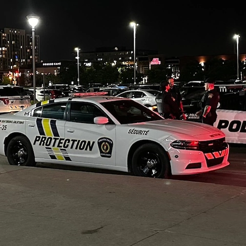Executive Protection being displayed by a Centurions Solutions Security Guard and his car
